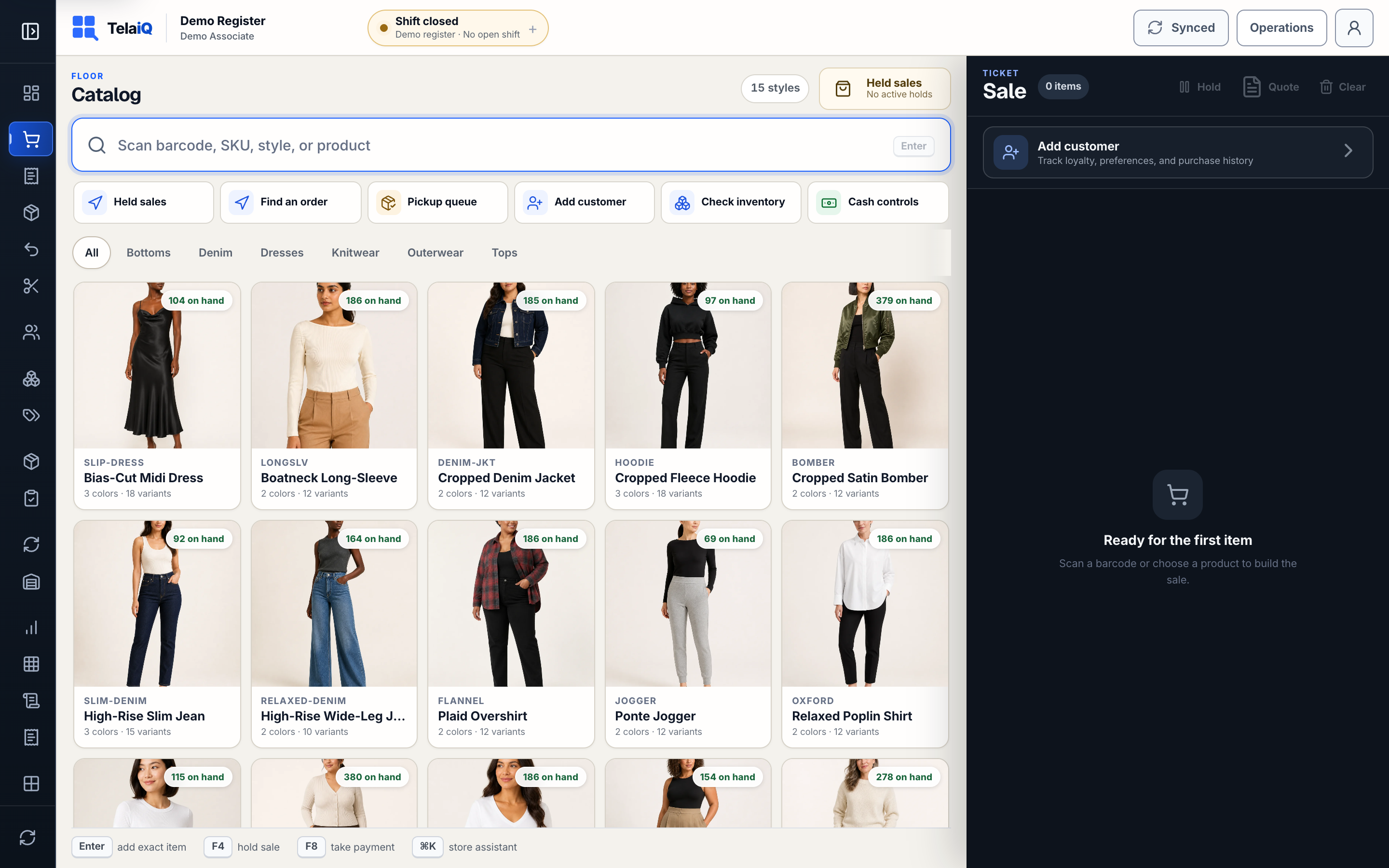 Register with a style × color product grid and a server-priced cart